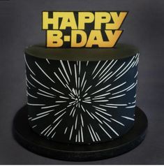 a black and white birthday cake with the words happy b - day on top