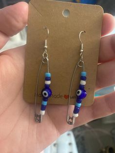 Beaded safety pin earring. These are real safety pins and they are glued closed but beware they may open with force. Safety Pin Earring, Corning Ny, Eye Safety, Safety Pin Earrings, Safety Pins, Safety Pin, Evil Eye, Jewelry Earrings Dangle, Etsy Earrings