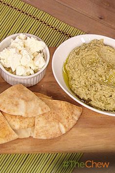 some pita bread and other food items on a table