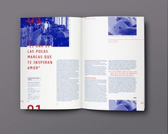 an open book with blue and red images on the cover, in spanish language is shown