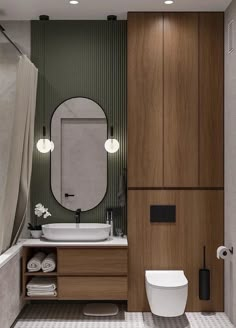 a bathroom with a toilet, sink and mirror