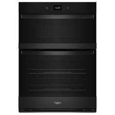 two black ovens side by side on a white background