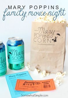 two sodas, a bag and some popcorn are sitting on a table with the words mary poppin's family movie night