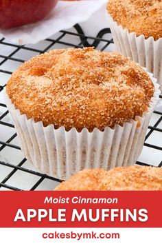 apple muffins on a cooling rack with apples in the background and text overlay that reads, most cinnamon apple muffins