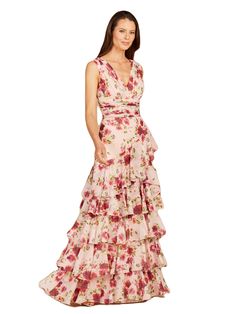 This v-neck print dress features an elegant ruffled skirt. Perfect for that daytime wedding or a beach theme party Back zip Chiffon polyester dress with chiffon lining Professionally clean Imported Designed for a wedding guest, gala party or a wedding event. Fits true to size Bra friendly Sheath fit Flowy V-neck Dress With Ruffles, V-neck Dress With Ruffles And Flowy Skirt, V-neck Flowy Skirt Dress With Ruffles, V-neck Maxi Dress With Ruffled Skirt, Tiered Chiffon Ruched Dresses, Ruched Tiered Chiffon Dresses, V-neck Flowy Skirt Dress For Garden Party, Feminine V-neck Maxi Dress With Ruffled Skirt, Beach Theme Party