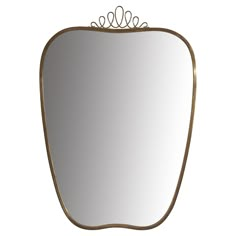 an apple shaped mirror with a gold frame and crown on the top, against a white background