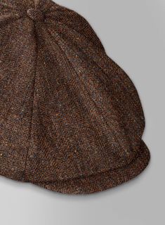 If you want to enjoy a tough-but-stylish look, then add our Haberdasher Autumn Rust Tweed  Newsboy Cap to your ensemble. 
 
 Inspired by the Thomas Shelby's style from Peaky Blinders, the newsboy tweed cap, also known as English Baker Boy Cap, with its vintage charm is sure to exude a classic elegance when paired with any outfit. 
 
 Made Using 100% Wool. 
 
 Add a touch of flair to a casual ensemble with this stylish cap. Brown Wool Beret For Fall, Wool Brimmed Beret For Fall, Fall Tweed Hat With Herringbone Pattern, Wool Visor Hat For Fall, Brown Tweed Hat For Fall, Fall Wool Visor Hat, Fall Tweed Hat With Short Brim, Fall Wool Hat With Visor, Fitted Tweed Hat For Fall