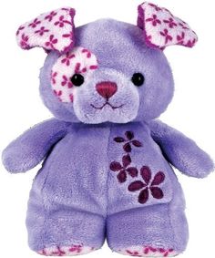 a purple teddy bear with pink flowers on it