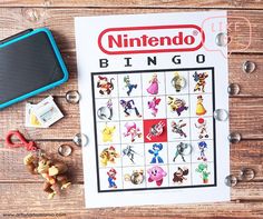 a nintendo game board sitting on top of a wooden table next to toys and other items