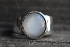 amazing natural white moonstone ring this is high quality white moonstone mens and womens ring stone size-12mm(approx.) *ship worldwide from india SHIPPING POLICY >After receipts of payment,ship within 1-3 days. >Delivery will take 12-20 days >any question please contact us. THANKS YOU VERY MUCH FOR VISITING US. Ring Moonstone, Womens Ring, Ring Mens, White Moonstone, Ring Stone, Mens Ring, 925 Silver Ring, Unisex Ring, Moonstone Ring