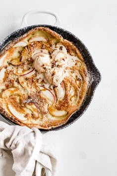 an apple pie with powdered sugar on top is ready to be eaten and served