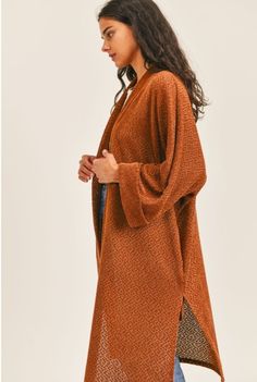 Model is 5'7" and wearing a size small. Made of 99% polyester and 1% spandex. Brown Long Outerwear For Loungewear, Long Brown Outerwear For Loungewear, Wrap Cardigan For Fall Loungewear, Open Knit Cardigan For Fall Loungewear, One Size Chic Cardigan For Fall, One Size Textured Knit Cardigan For Fall, Brown Cardigan For Spring Loungewear, Brown Spring Cardigan For Loungewear, Fall Wrap Cardigan For Loungewear