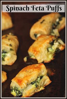 spinach and feta puffs on a baking sheet with text that reads spinach and feta puffs