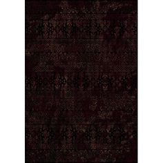 an area rug with black and brown colors