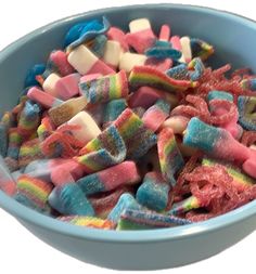 a blue bowl filled with lots of colorful candy