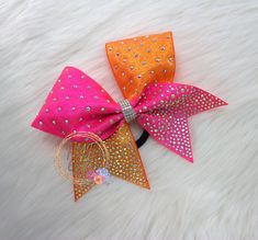 "FREE SHIPPING OVER $50 TEAM ORDER NOTE: If you are order more than 5 at a time, send a message to discuss a timeframe. We have 5-7 business day processing times on most bow orders. However, we will need to give you an accurate quote for large team/gym orders on timeframe. -QTY: 1pc Cheer Bow -SIZE: Approximately 7\"x7\". Each are hand made/folded and can vary slightly due to the fold and shape of each. -MATERIAL: 3\" Grosgrain with full glitter on front. AB Rhinestones pressed on the glitter ri Basketball Cheer Bows, Competition Bows, Dance Bows, Basketball Cheers, Glitter Cheer Bow, Bling Dress, Dance Hairstyles, Glitter Ribbon, Cheer Bow