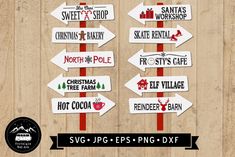 christmas signs on wooden boards with red ribbon around them and the words santa's workshop, ski patrol, frosty pole, hot cocoa bar, north pole, etc