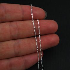 The last picture shows the rhodium plated chains. It looks like slightly oxidized chains. Material: 925 sterling silver, and rhodium Plated over sterling silver Size: 6.7 mm * 1mm Quantity : 3 feet Product Code: 101007 This chain is available in: Gold plated Sterling Silver: https://www.etsy.com/listing/480632251 Rhodium Sterling Silver: https://www.etsy.com/listing/467143886 How to Finish All you need to finish this chain to a ready to wear piece of jewelry: Jumprings: https://www.etsy.com/list Extra Long Necklace, Twisted Chain, Sterling Silver Anklet, Sterling Silver Chain Necklace, Chain Silver, Silver Anklets, Foot Jewelry, Chain Jewelry, Oxidized Sterling Silver