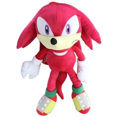 sonic the hedgehog plush toy is red and has white spots on it's legs