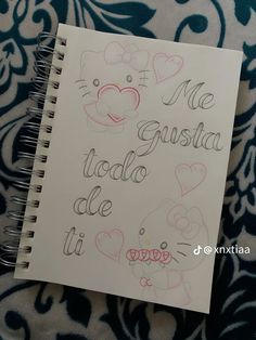 a notebook with writing on it that says me gustia toda de ti