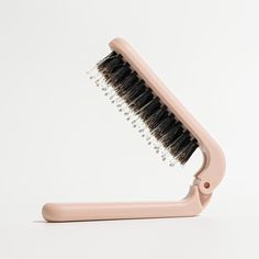 Travel Hair Brush, Mini Folding Hairbrush Comb with Boar Bristles for Women, Men, and Children, Small Compact Pocket Size for Wet and Dry Hair, Curly and Detangle, Ideal for Purse - Ballet Pink 📋 Overview 💡 Features 【180° Folding, Pocket-size Design】: Easily fit this travel hairbrush in your purse or pocket with its 180° folding feature. Designed to be compact and portable with the best hair smoothing performance, it is perfect for you on the go or the kid’s first brush. 【Boar Bristles and Nylon Pins】: Experience gentle detangling and advanced smoothing with the golden ratio (1.618) combination of cruelty-free boar bristles and nylon pins. Suitable for both wet and dry hair, reduces hair breakage, and is ideal for ALL hair types, women, men, and children. 【Mini But Mighty】: Despite its s Hair Smoothing, Travel Hair, Travel Hairstyles, Promote Healthy Hair Growth, Styling Brush, Ballet Pink, Golden Ratio, Hair Breakage, Bad Hair Day