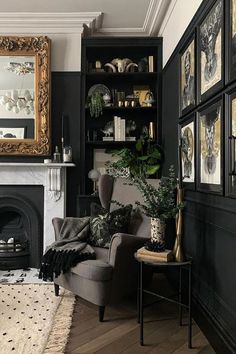 a living room filled with furniture and a fire place in front of a mirror on the wall