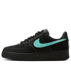 The Nike Air Force 1 Low SP 'Tiffany Co' is a stylish and timeless sneaker. It features a black and Tiffany Blue colorway, with a rubber sole and a unique design. The signature black and Tiffany Blue hues of the SB Dunk are reminiscent of the iconic colors of the jewelry design company. The classic silhouette is enhanced with a black suede upper and Swoosh rolled leather. The heel features a chrome applique and an etched tongue label. The laces are not the traditional sport laces, but rather the thick rope laces seen on Tiffany & Co. bags and handles. This sneaker is perfect for any occasion, from casual days to formal events. It is sure to be a timeless classic. (AF1/SNKR/Retro/Skate/Unisex/Crossover) Nike Air Force 1 Tiffany, Academia Aesthetic Wallpaper, Thick Rope, Sb Dunk, Academia Aesthetic, Air Force 1 Low, Tiffany Blue, Nike Air Force 1, Classic Silhouette