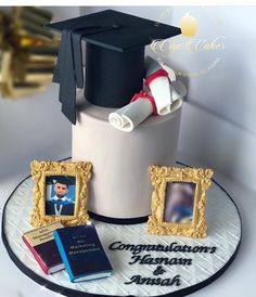 a graduation cake is decorated with an image of a graduate's cap and diploma