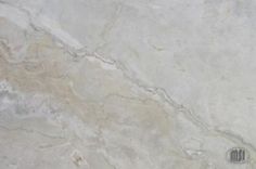 a white marble textured surface with grey veiners