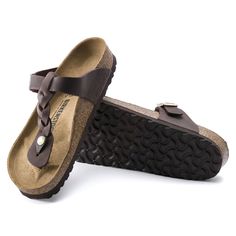 Brown Flip Flops With Textured Footbed, Leather T-strap Flip Flops With Cork-bed Midsoles, Classic Brown Flip Flops With Leather Footbed, Brown Leather Footbed T-strap Sandals, Brown Leather Footbed Flip Flops With Single Toe Strap, Brown Toe Post Flip Flops With Leather Footbed, Brown T-strap Sandals With Leather Lining, Brown T-strap Sandals With Leather Footbed And Toe Loop, Brown Toe Post Flip Flops With Rubber Sole