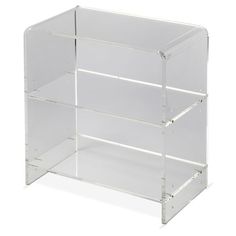 clear acrylic shelf unit with three shelves on each side and four sections at the bottom