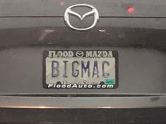 a mazda license plate on the back of a car