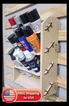 a wooden shelf filled with lots of bottles and other items on it's side