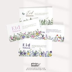 three cards with floral designs on them and the words eid mubarak written in arabic