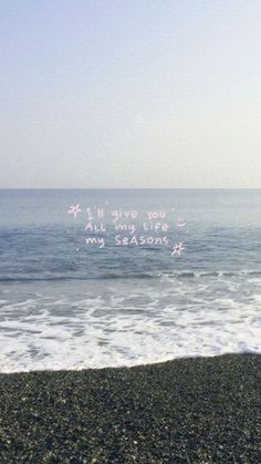 an ocean view with the words all my life written in pink