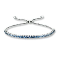 This breathtaking bolo bracelet from the Le Vian® Denim Ombre™ collection showcases delicious flavors of natural sapphires that graduate from light to dark, bordered by sweet Vanilla Diamonds® on either side. Crafted of 14K Vanilla Gold®, the bracelet has a total diamond weight of 1/10 carat, and accommodates wrist sizes up to 9 inches with an adjustable bolo clasp. Le Vian®. Discover the Legend. Ombre Bracelet, Jewelry Style Guide, Bracelet With Diamonds, Bolo Bracelet, Jewelry Staples, Jared The Galleria Of Jewelry, Le Vian, Love Things, Sapphire Bracelet