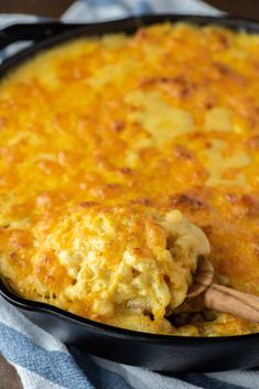 baked cheddar mac and cheese in a cast iron skillet