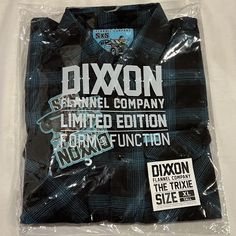 Elevate your casual style with this Dixxon Flannel Shirt in Blue, featuring a collared neckline and long sleeves with buttoned cuffs. The shirt is made of lightweight polyester flannel, perfect for all seasons, and adorned with an embroidered logo and button accents. The shirt is designed with a regular fit, suitable for men of all sizes, and is ideal for casual occasions such as outdoor activities or preppy gatherings. The shirt is perfect for those who appreciate designer clothing and classic styles, and it comes in a size L, making it a great addition to any wardrobe. Dixxon Flannel, Flannel Men, All Seasons, Outdoor Activities, Casual Style, Button Downs, Classic Style