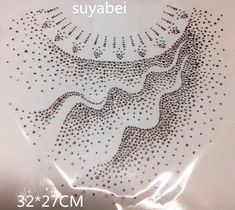 the back side of a plastic bag with silver sequins and an image of a horse on it