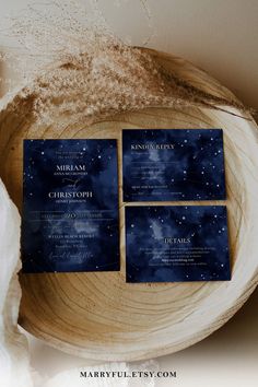 the wedding stationery is set on top of a wood slice with space in the background