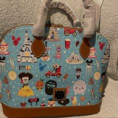 Stunning, Nwt Jarrod Maruyama Satchel. Hand Picked Placement . Detachable Crossbody Strap Included. Dooney And Bourke Disney, Dooney & Bourke Bag, Disney Dooney, Brown Leather Satchel, Dooney Bourke Handbags, Canvas Purse, Leather Satchel Bag, Ostrich Leather, Purse Jewelry