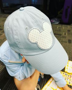 Blue hat with blue dot Mickey. Playful Blue Cotton Hats, Blue Cotton Brimmed Baseball Cap, Blue Brimmed Cotton Baseball Cap, Fun Blue Visor Baseball Cap, Cute Adjustable Light Blue Hat, Cute Blue Baseball Cap With Curved Brim, Cute Blue Adjustable Baseball Cap, Casual Light Blue Brimmed Hat, Fun Blue Cotton Hat