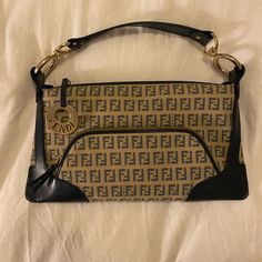 This Is An Authentic Fendi Bag Dark Navy And Beige. Never Used It Has Been In My Closet And Has No Dust Bag. In Great Condition 12x7x2 Inches Fendi Monogram Bag, Fendi Pochette, Fendi Monogram, Fendi Bag, Bag Dark, Vintage Handbag, Vintage Shoulder Bag, Monogram Bag, Vintage Bag