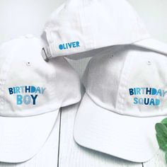 "These fun boys birthday hats are a cool choice for you and everyone in your birthday crew! Choose \"Birthday Boy\" or \"Birthday Squad\" and personalize each birthday hat with the color and name or custom text of your choice.  These designs are available on our small fit hats (recommended for ages 5 - small adult) or our classic adult hats.  𝗗𝗘𝗦𝝞𝗚𝝢𝗦 * Birthday Boy * Birthday Squad * Birthday Girl  𝗗𝗘𝗦𝗜𝗚𝗡 𝗖𝗢𝗟𝗢𝗥𝗦 * Blue * Multi (red/black/blue) * Green * Pink * Purple 𝗣𝗘𝗥𝗦? Adjustable Curved Brim Hat For Birthdays, White Adjustable Snapback Hat For Birthday, Adjustable Curved Brim Snapback Hat For Birthday, Novelty Curved Brim Hat For Birthday, White Adjustable Baseball Cap For Father's Day, Adjustable Curved Brim Dad Hat For Birthday, White Snapback Baseball Cap For Birthday, Fun Curved Brim Hat For Birthday, Themed White Cap