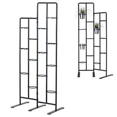 two tall metal racks with plants on them