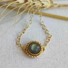 A natural Labradorite bracelet, a window to your inner worlds. This unique gemstone, with its mystical shimmer, connects you with your intuition and grants you spiritual powers.  The perfect Jewelry to complete any look, add a touch of magic to any outfit. Each bracelet is a one-of-a-kind piece, handcrafted with high-quality gold plating. Labradorite is a stone of protection, connection, and empowerment, and will accompany you on your journey. The stone house in the bracelet is handmade and inside it is placed a stunning labradorite stone with a delicate and special color. A delicate chain of loops is attached to the stone house for convenient closure according to the length of the bracelet that suits you personally. Natural gemstone in an 18k gold plated charm on an adjustable chain. DIME Labradorite Bracelet, Spiritual Power, Stone House, Unique Gemstones, Labradorite Stone, Gold Plating, Precious Metals, Precious Stones, Handmade Natural