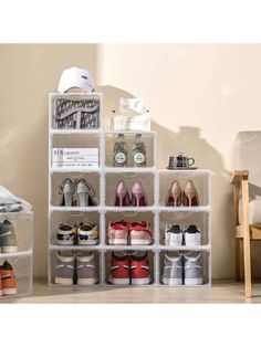 the shoe rack is filled with many pairs of shoes and other things to put in it