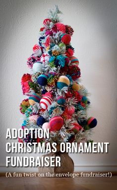 a colorful christmas tree with the words adoption christmas ornament fundraiser