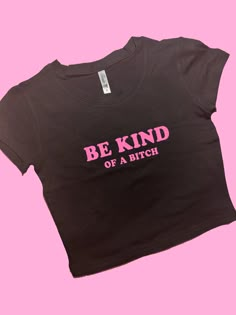 Be Kind SNUG FIT Crop Top | Crop Top | Graphic Top | Gift For Her | Y2K Baby Tee | Y2K crop top | Gift for friend Comfy Top to Lounge in! Actual item may be lighter/darker than pictured. M A T E R I A L S - SNUG FIT - 100% RING SPUN COTTON - Shoulder Taping S I Z I N G - Size chart is available on our listing photos. S H I P P I N G  &  P R O D U C T I O N  T I M E - Production Time is 2-3 Business Days. (May be delayed during the Holiday Season) - Shipping Time is 2-5 Business Days. (May be del Edgy Shirts Graphic Tees, Iconic T-shirts, Slogan Shirts 2000s, Crop Tops With Words, Trendy Black Cropped T-shirt With Slogan, Fitted Crew Neck Crop Top With Funny Text, Y2k Fitted Crop Top With Funny Text, Fitted Y2k Crop Top With Funny Text, Fitted Graphic Tee Crop Top With Funny Text