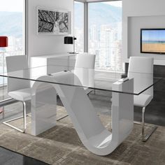 an image of a modern dining room set with glass top table and white leather chairs